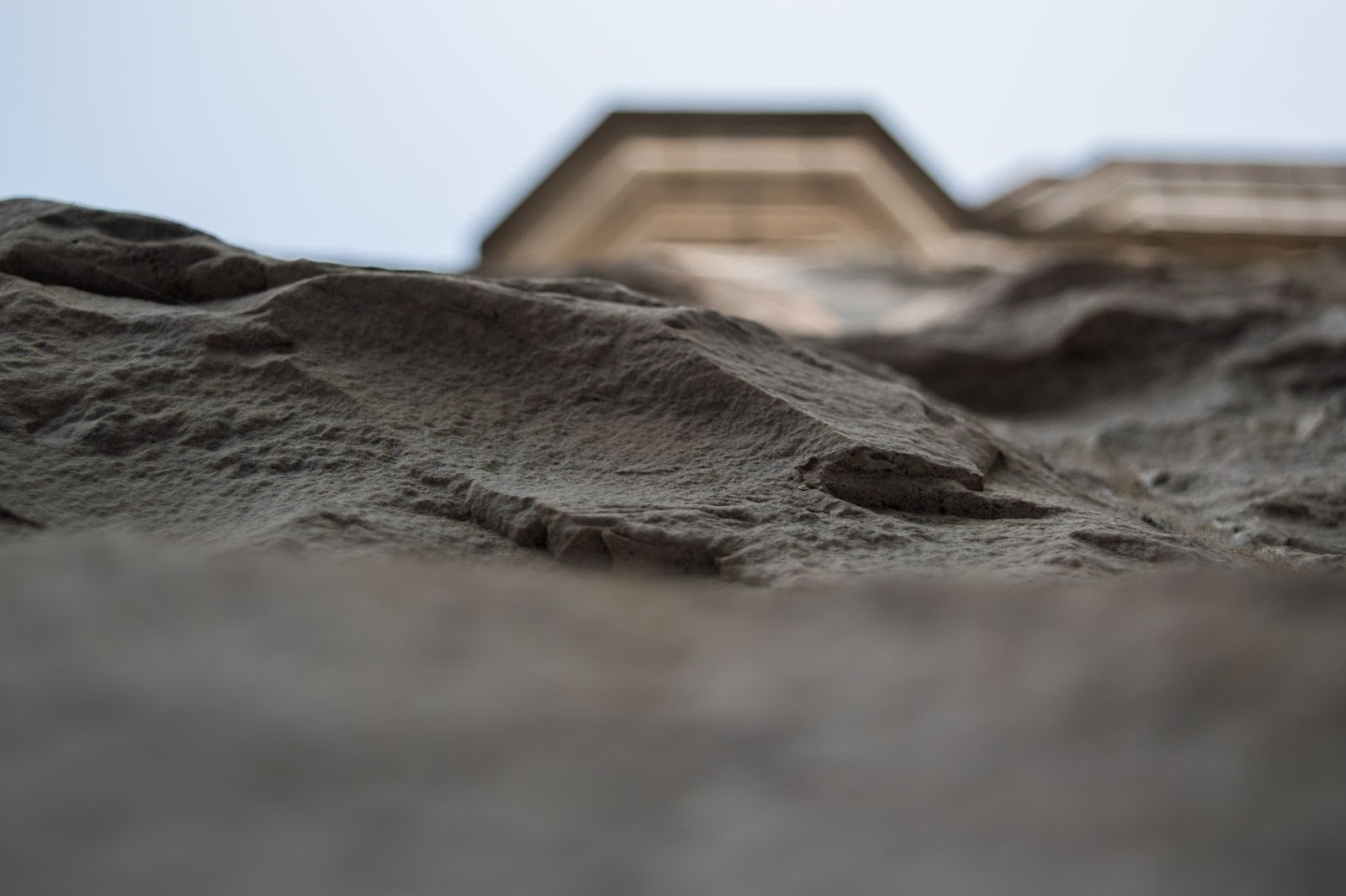 Picture 7: Close up picture portraying the details of a stone used to build outer wall of a building